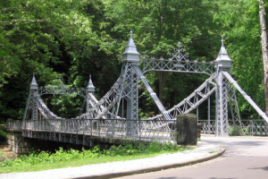 The silver suspension bridge in Mill Creek MetroParks.